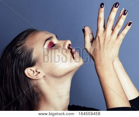 problem depressioned teenager with bleeding nose, real junky close up mainstream angry concept fashion