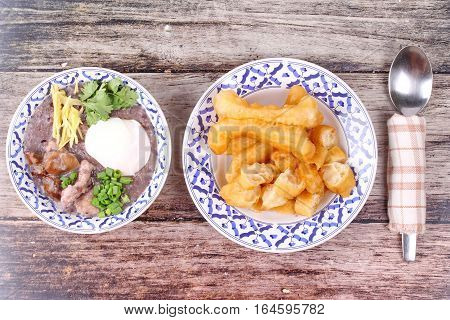 Red Brown Rice , Porridge With Mined Pork And Chicken Lever .
