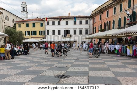 LAZISE ITALY - MAY 6 2016: Shops bars and restaurants in Lazise at Garda Lake. Italy