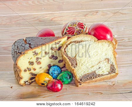 Cakes Called Pasca Made With Cheese And Raisins, Cozonac With Smashed Nuts, Traditional Colored East