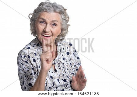 portrait of beautiful mature woman, posing against white background