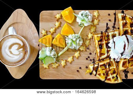 Traditional Belgian waffles with ice cream fruit and coffee mocca