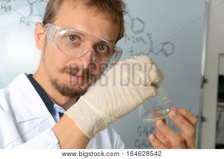 Chemist scientist conducts research of medical product in the laboratory