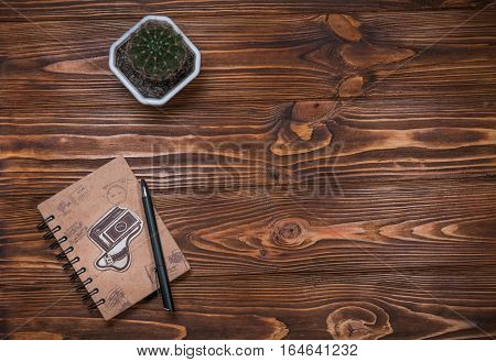 notebook with a pen on the table