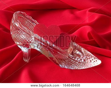 Two red hearts in the glass slipper