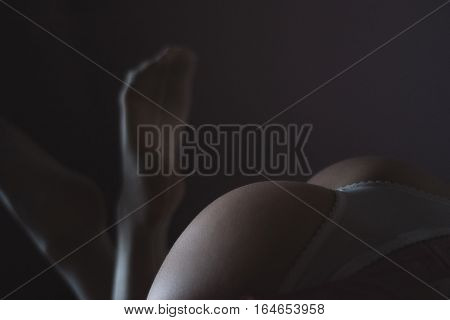 Feminine curves in the shade in daylight