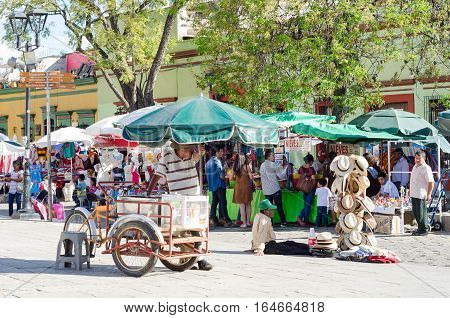 OAXACA, OAXACA, MEXICO - DECEMBER 26, 2016: Vendors at tourist walkway in a sunny day in Oaxaca,  Mexico