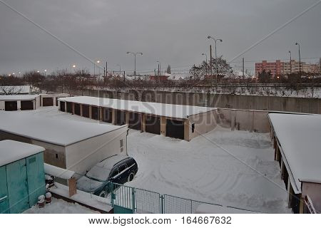Chomutov Ustecky kraj Czech republic - January 05 2017: garages and road number 13 in the afternoon after snowfall