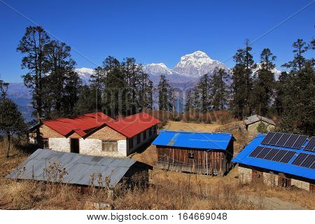 Lodges on top of Mohare Danda. View of mount Dhaulagiri.