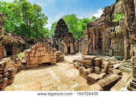 Mossy Buildings With Carving Of Ancient Ta Som Temple In Angkor