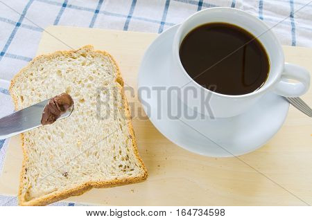 black coffee with whole wheat bread for breakfast