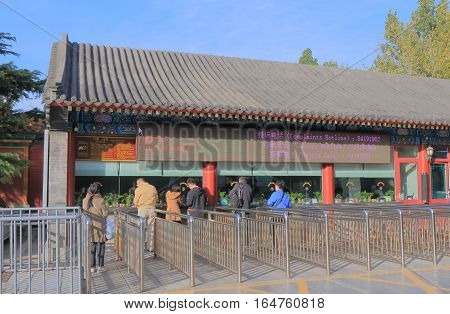 BEIJING CHINA - OCTOBER 28, 2016: Unidentified people buy admission for Lama Temple. Lama Temple originally served as an official residence for court eunuchs built in 1697