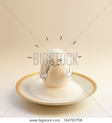 Nice egg on a saucer with hands smiling. Happy easter