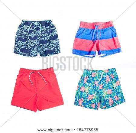 Collage of different shorts for boys of different colors