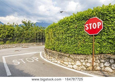 Red Hexagonal Stop Sign On Metal Pole