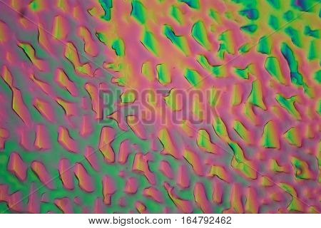 Xylitol crystals under the microscope and in polarized light. Xylitol is a sugar alcohol and used as sweetener.