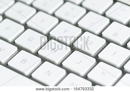 element computer taken in the foreground with white backgrounds