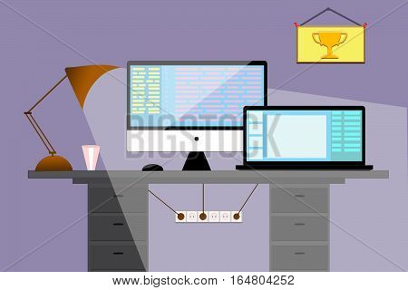 Workplace in office. Computer mono block and a laptop on the table