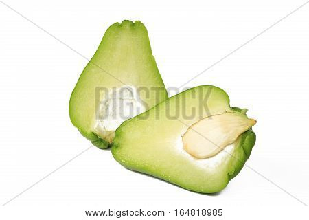 Chayote (Sechium edule) halved fruit isolated against white background