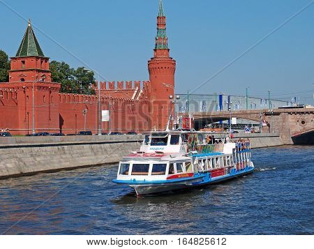 MOSCOW - JULY 2012: River tourism view from the Moscow River on the Moscow Kremlin Kremlin embankment Petrovskaya and Beklemishevskaya Towers Bridge Big Moskvoretsky