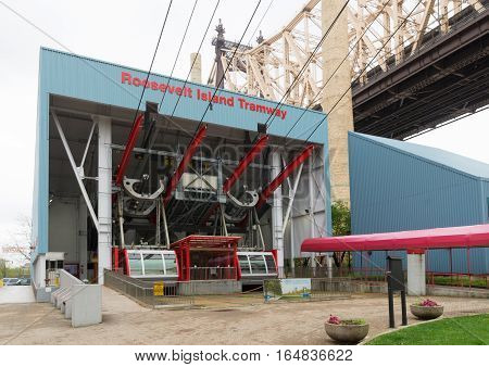 NEW YORK - MAY 3 2016: cable car house of the roosevelt island tramway. Each cabin accommodates a capacity of 125 people makes approximately 115 trips per day and about 100 on weekends.
