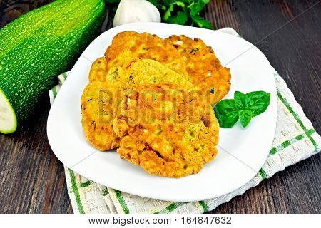 Flapjack Chickpeas With Zucchini In Plate On Dark Board