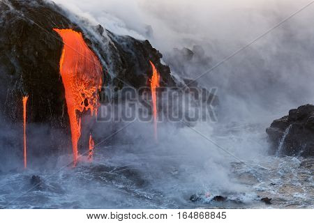 Lava from the Kilauea Volcano eruption in Hawaii entering the pacific ocean