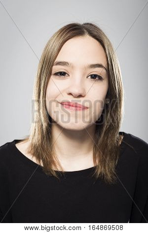 Expressive portrait of girl with neutral background