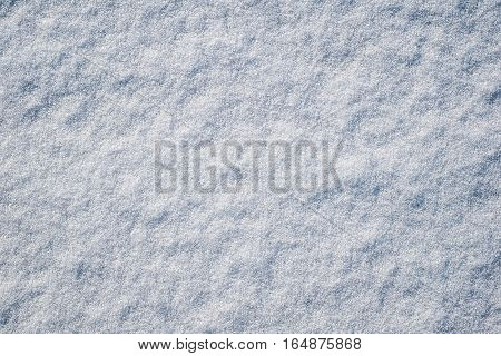 Background of fresh snow texture in blue tone