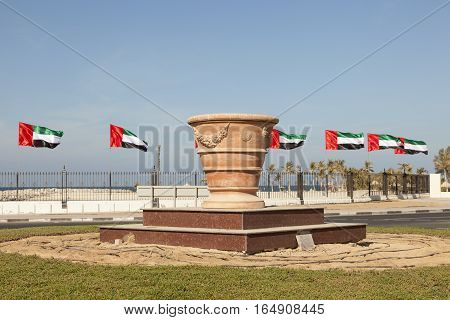 Giant flower pot in a roundabout in the city of Dubai United Arab Emirates