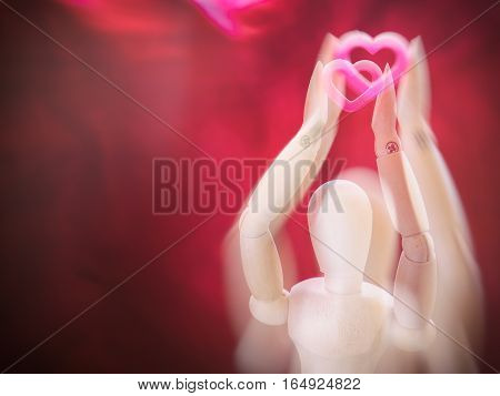 Still Life Wooden Puppet And Pink Heart.