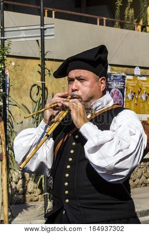 SELARGIUS, ITALY - September 11, 2016: Former marriage Selargino - Sardinia - portrait of a musician launeddas parading in traditional Sardinian costume