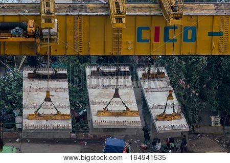 Delhi, India - 8th Jan 2017: Prefabricated concrete blocks used for the construction of the overhead delhi metro.
