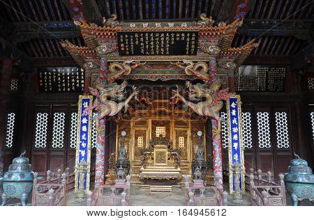 Shenyang Imperial Palace (Mukden Palace) Throne of Chongzheng Hall, Shenyang, Liaoning Province, China. Shenyang Imperial Palace is UNESCO world heritage site built in 400 years ago.