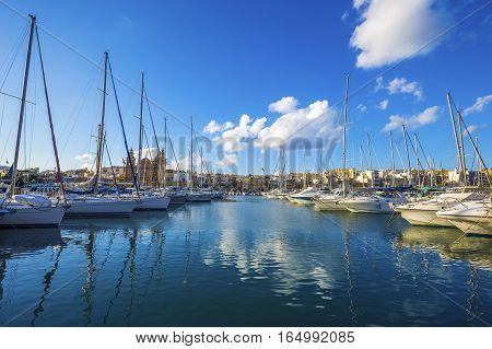 Msida Malta - Yacht marina with blue sky and nice clouds on a summer day