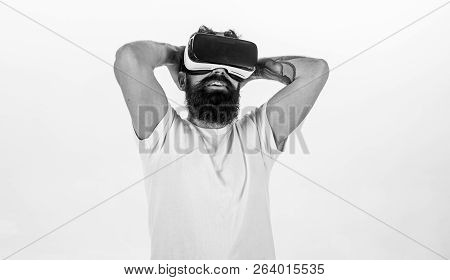 Man With Beard In Vr Glasses Enjoy Watching Video, White Background. Virtual Cinema Concept. Guy Wit