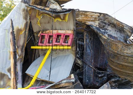Damaged Industry Supermarket Metallic Facade After Arson Fire With Burnt Debris After Intense Burnin
