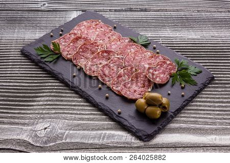 Saucisson Sec Delicious French Salami On A Wooden Background