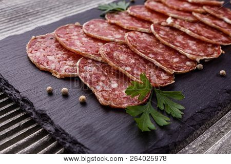 Saucisson Sec Delicious French Salami On A Wooden Background