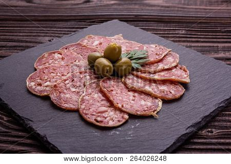 Saucisson Sec Delicious French Salami On A Wooden Background