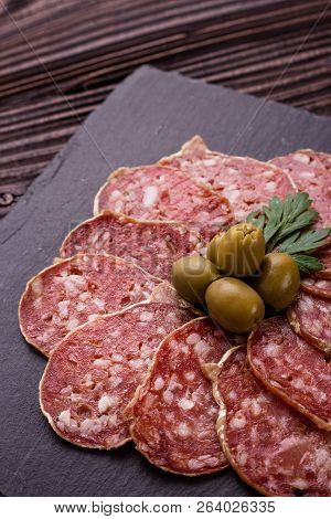 Saucisson Sec Delicious French Salami On A Wooden Background