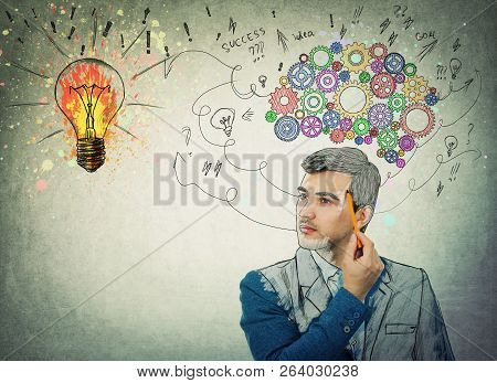 Serious Businessman Pencil Pointed To Head, Draw Himself As A Personality. Idea Concept, Creative Th