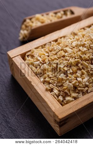 Fragrant Dried Parsnip On A Dark Stone Background