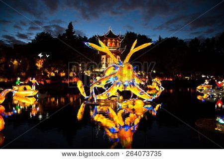 MONTREAL,CANADA- SEPT 8 2018: Botanical garden exhibit in Mtl Glittering lanterns of various shapes illuminate the Chinese Garden and the eyes of thousands of visitors who come to enjoy the spectacle.