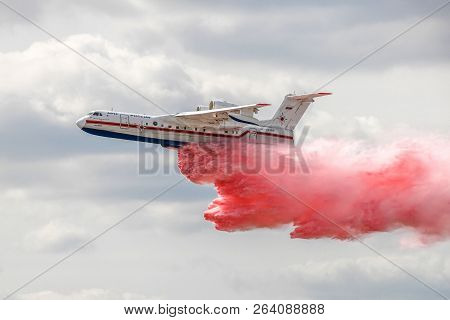 Zhukovsky, Russia - August 28, 2015: Beriev Be-200 Drops Colored Water In Flight