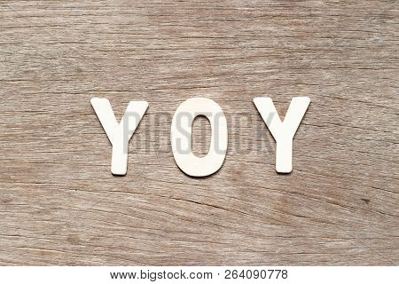 Alphabet Letter In Word Yoy (abbreviation Of Year Over Year) On Wood Background