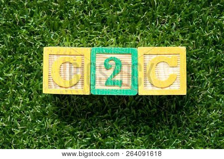 Color Wood Block In Word C2c (abbreviation Of Customer To Customer) On Artificial Green Grass Backgr
