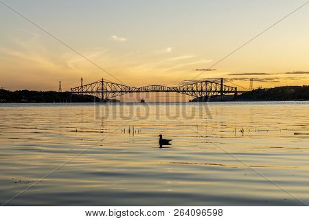 Quebec City Bridge In Canada On The Sunset