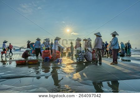 Mui Ne, Vietnam - September 28th, 2018: Fish Market Session Seas Scene People Gathered Inside Basket