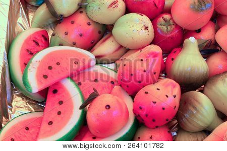 Watermelons, Kiwis And Marzipan Persimmons For Sale In A Candy Store